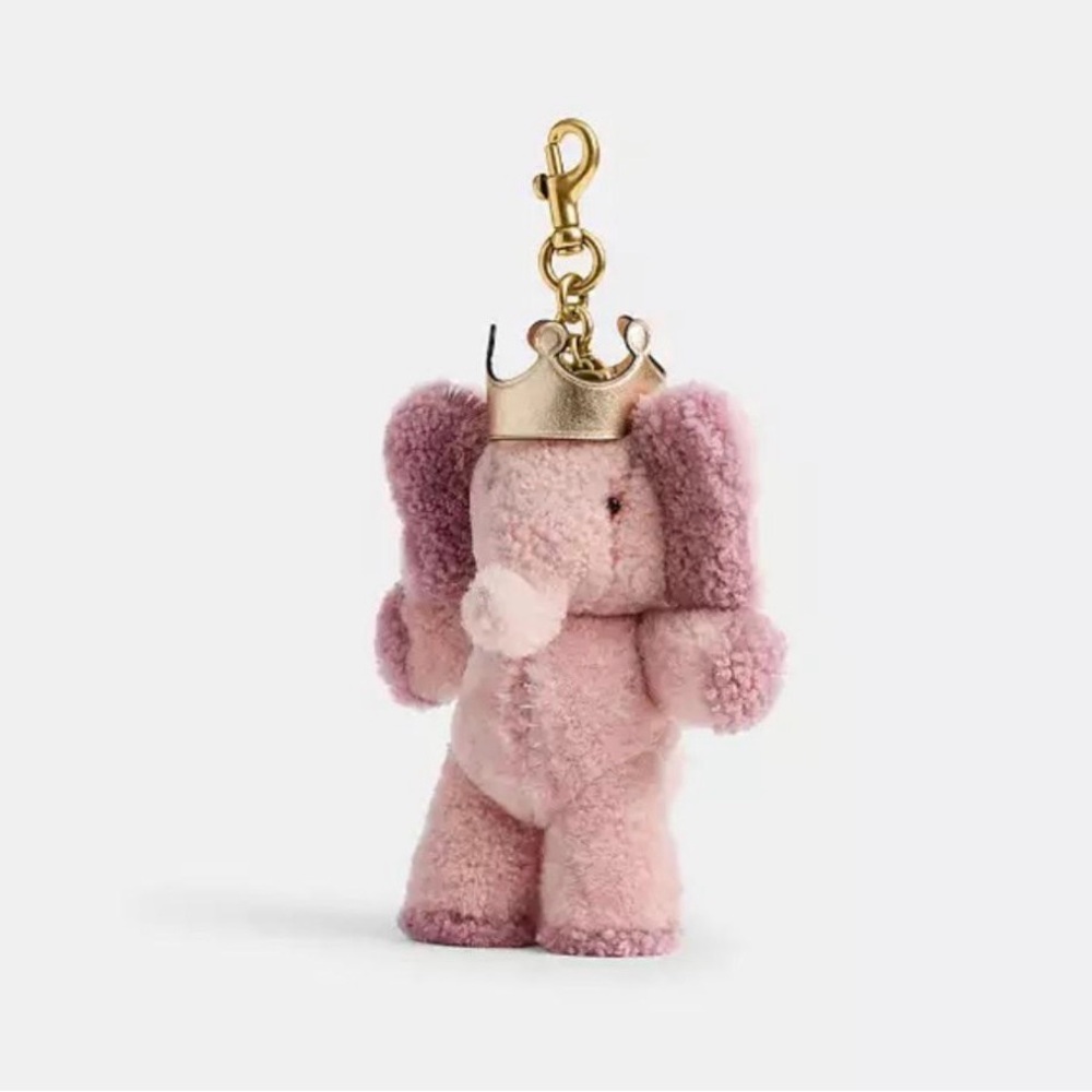 BNWT. Coach ELLIE Pink Elephant with Gold Crown bag charm.